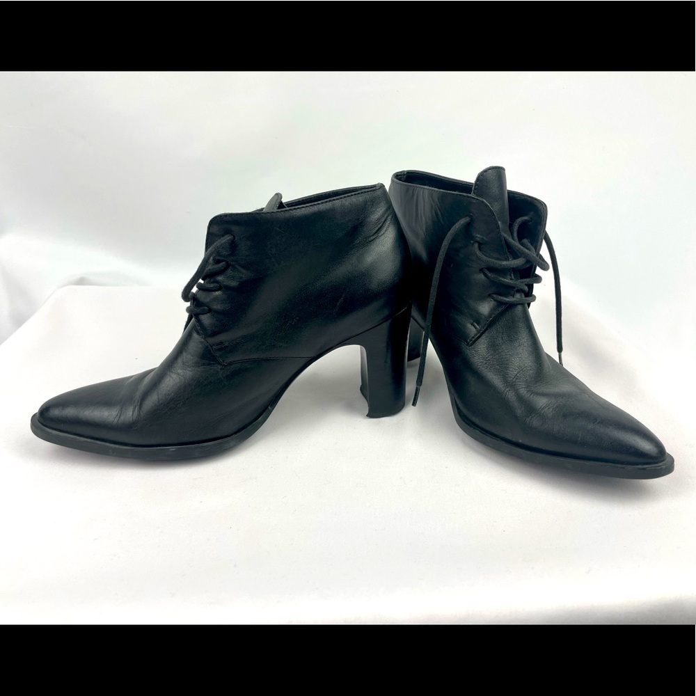 Apostrophe size 6.5 black leather booties.